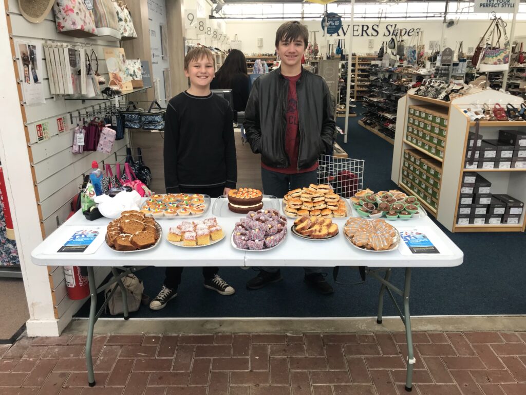 Kerry's sons holding the cake sale at Pavers in Stapleton. 