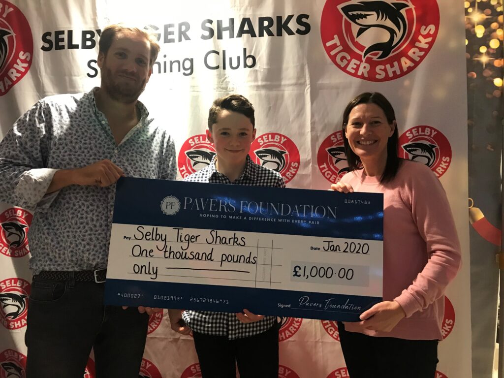  Andy Moore , Chairman of Selby Tiger Sharks with Alex McCallum, Junior Captain and Tina Pinder, Head of HR at Pavers Head Office in York.